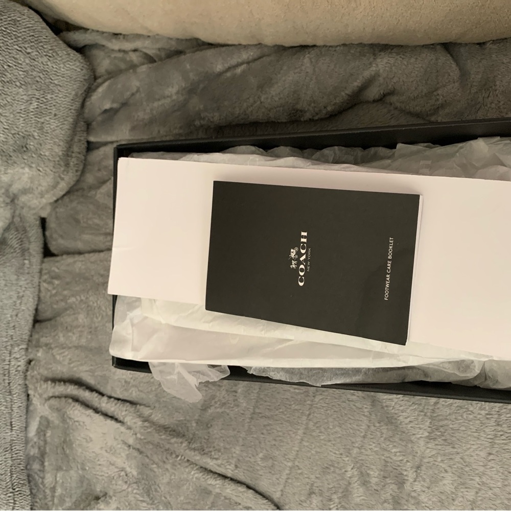 Coach size 7 brand new never worn. My feet are narrow these didn’t fit. 70.00